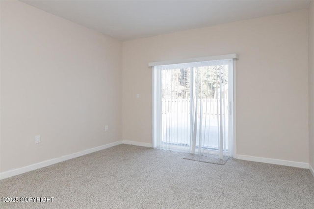 2429 Outside Blvd, North Pole, AK 99705 - spare room featuring carpet and baseboards