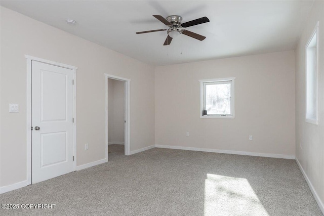 2429 Outside Blvd, North Pole, AK 99705 - spare room featuring carpet floors, ceiling fan, and a smoke detector