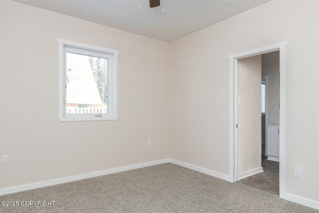 2429 Outside Blvd, North Pole, AK 99705 - carpeted spare room featuring ceiling fan and baseboards
