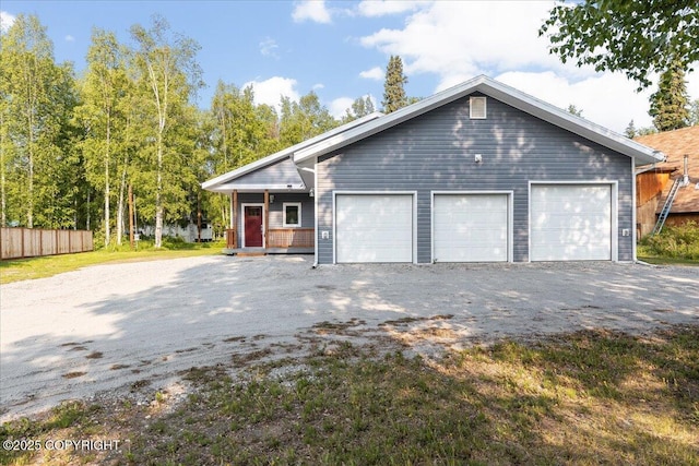 2429 Outside Blvd, North Pole, AK 99705 - view of front of house with a detached garage and covered porch