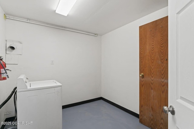 906 Lancaster Dr, Anchorage, AK 99503 - laundry room with washer / dryer and baseboards