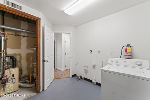 906 Lancaster Dr, Anchorage, AK 99503 - washroom with washer / clothes dryer and baseboards