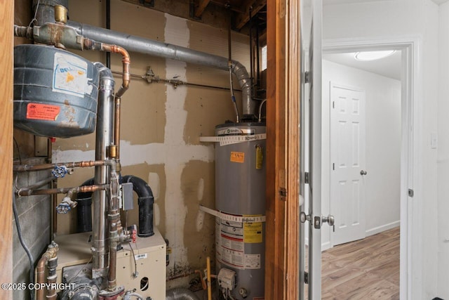 906 Lancaster Dr, Anchorage, AK 99503 - utility room featuring water heater