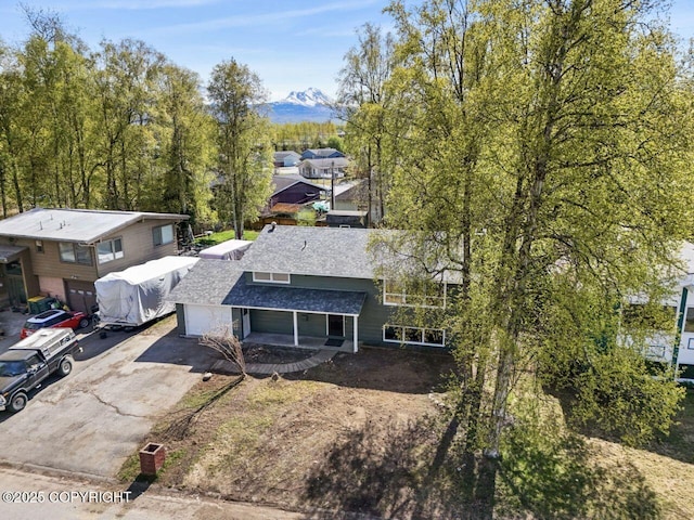 906 Lancaster Dr, Anchorage, AK 99503 - aerial view of property and surrounding area featuring a mountain backdrop