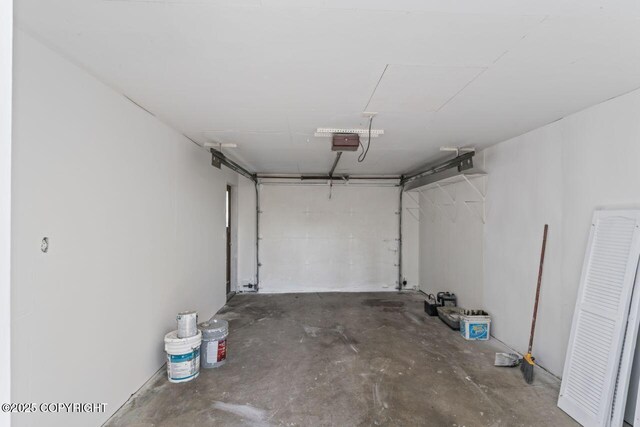 906 Lancaster Dr, Anchorage, AK 99503 - garage with a garage door opener