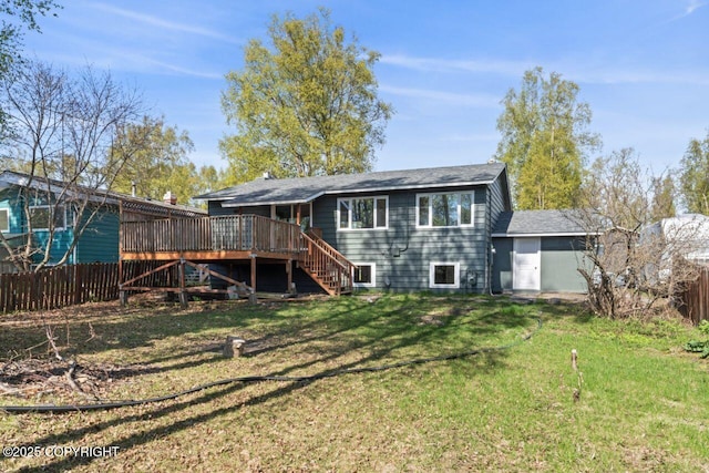906 Lancaster Dr, Anchorage, AK 99503 - back of property with stairs, a deck, and roof with shingles