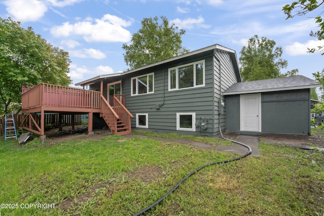 906 Lancaster Dr, Anchorage, AK 99503 - back of house with stairway, a wooden deck, and a yard
