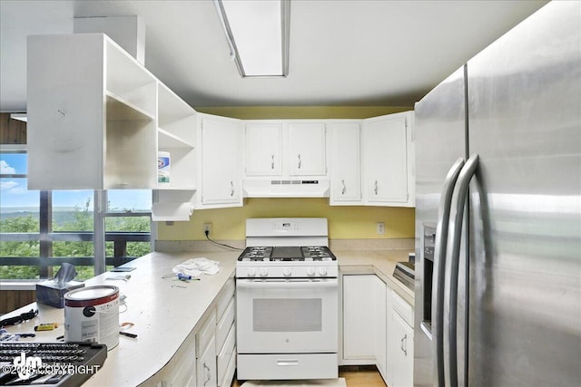 22032 Spring Creek Ln, Chugiak, AK 99567 - kitchen with stainless steel fridge with ice dispenser, white range with gas stovetop, under cabinet range hood, open shelves, and light countertops