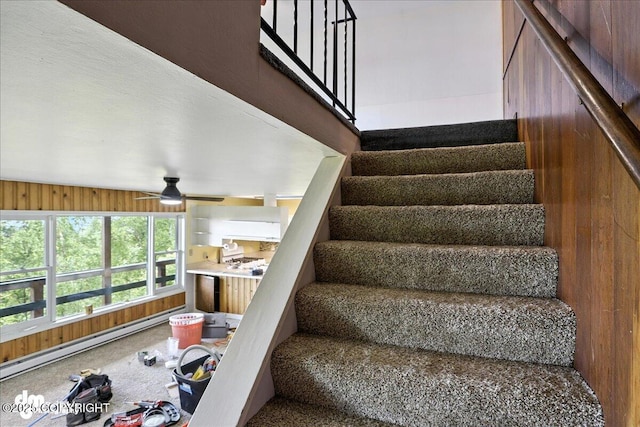 22032 Spring Creek Ln, Chugiak, AK 99567 - stairway with a baseboard heating unit and a ceiling fan