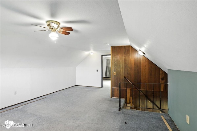 22032 Spring Creek Ln, Chugiak, AK 99567 - additional living space with lofted ceiling, carpet flooring, and ceiling fan