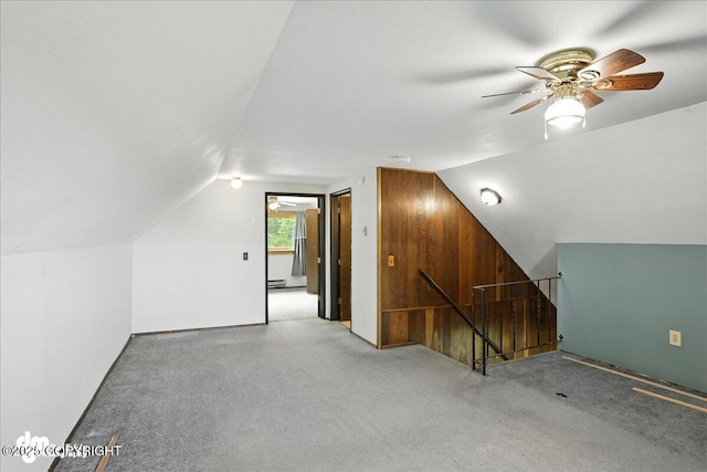 22032 Spring Creek Ln, Chugiak, AK 99567 - additional living space featuring lofted ceiling, a ceiling fan, and carpet flooring