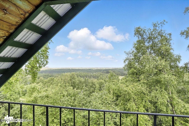 22032 Spring Creek Ln, Chugiak, AK 99567 - balcony featuring a wooded view