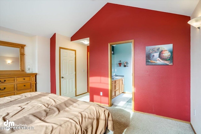bedroom with baseboards, light carpet, and vaulted ceiling