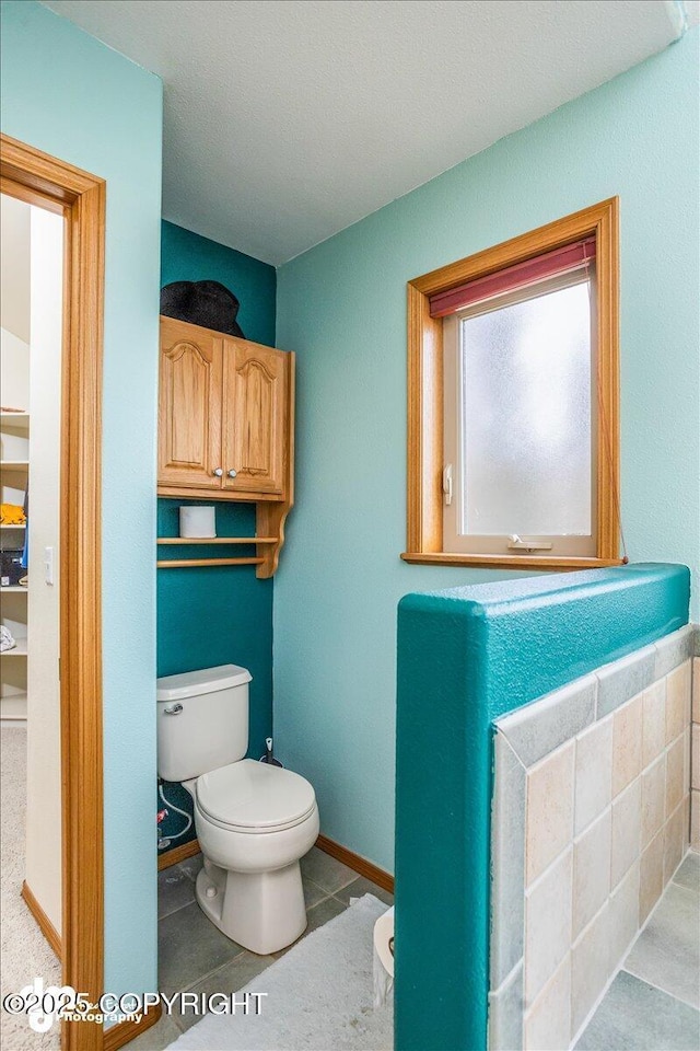 bathroom featuring toilet