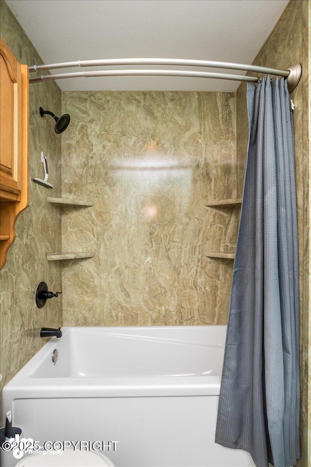 bathroom with shower / bathtub combination with curtain