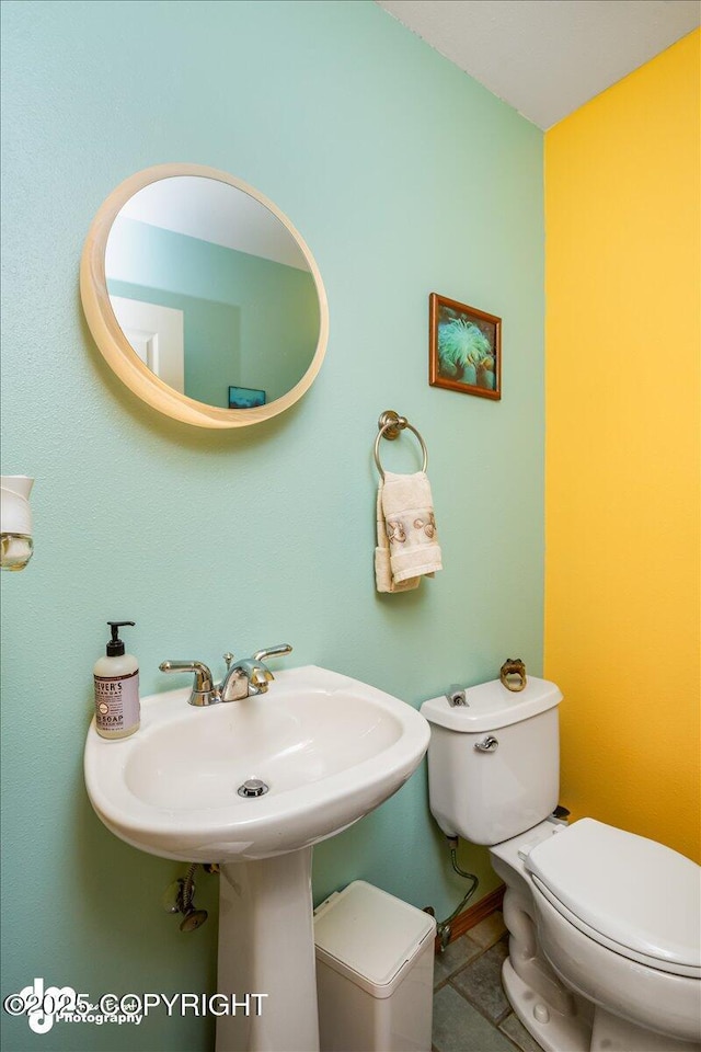 bathroom featuring toilet