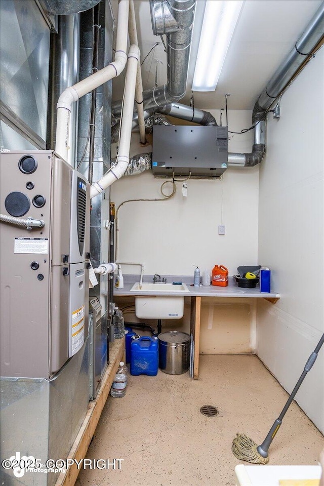 utility room featuring a sink
