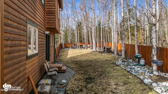 view of yard featuring a fenced backyard