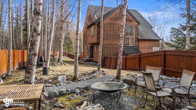 exterior space featuring a fenced backyard