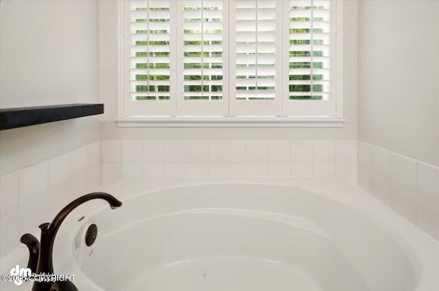 bathroom featuring a garden tub