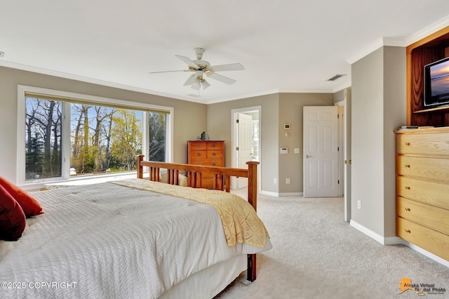 bedroom with baseboards, light colored carpet, crown molding, a ceiling fan, and connected bathroom