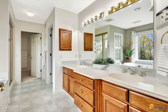full bath featuring double vanity and tile patterned floors