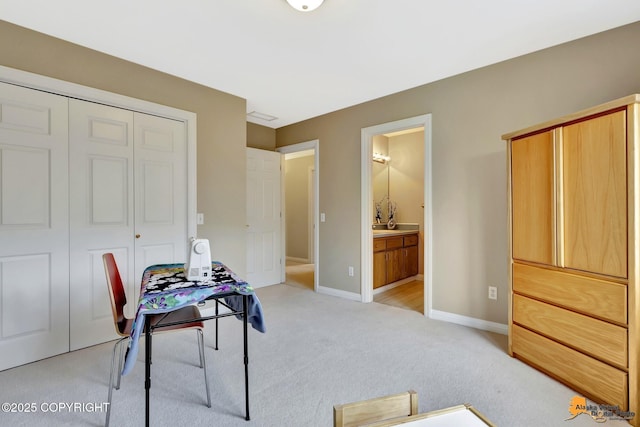 office with light colored carpet and baseboards