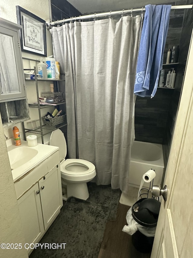 full bath featuring wood finished floors, toilet, and vanity
