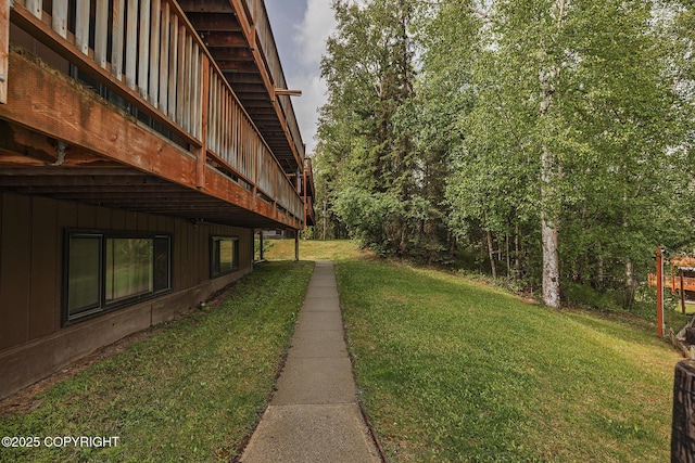8516 Boundary Ave # E3, Anchorage, AK 99504 - view of grassy yard featuring a wooden deck