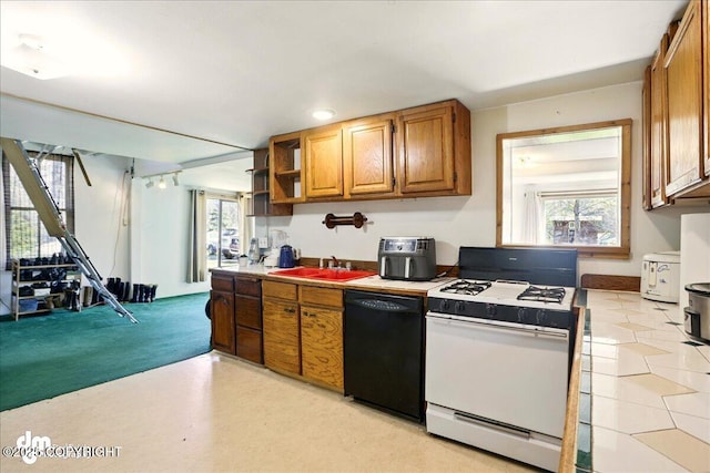 kitchen with dishwasher, white gas range oven, a sink, brown cabinetry, and open shelves