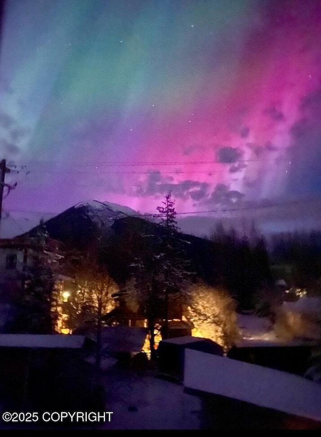 nature at dusk featuring a mountain view