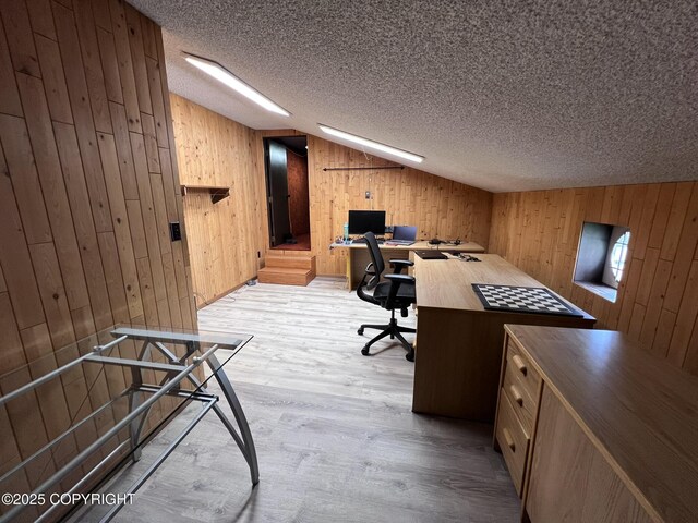 7700 Dover Ave, Anchorage, AK 99504 - office with wooden walls, wood finished floors, and a textured ceiling