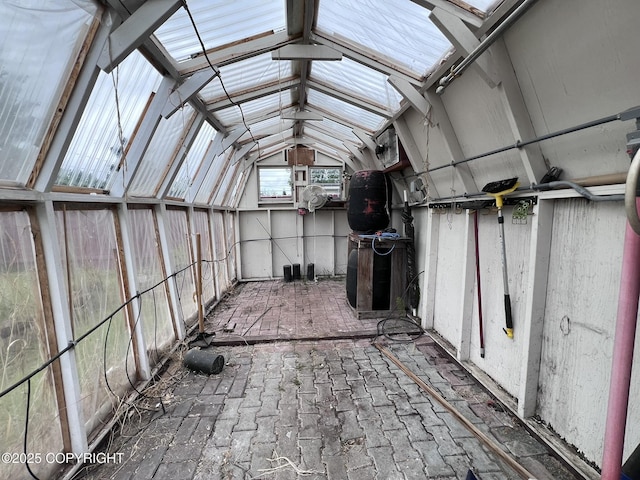 7700 Dover Ave, Anchorage, AK 99504 - unfurnished sunroom with lofted ceiling