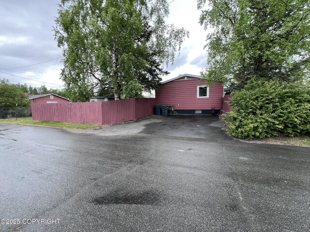 7700 Dover Ave, Anchorage, AK 99504 - view of side of property with driveway