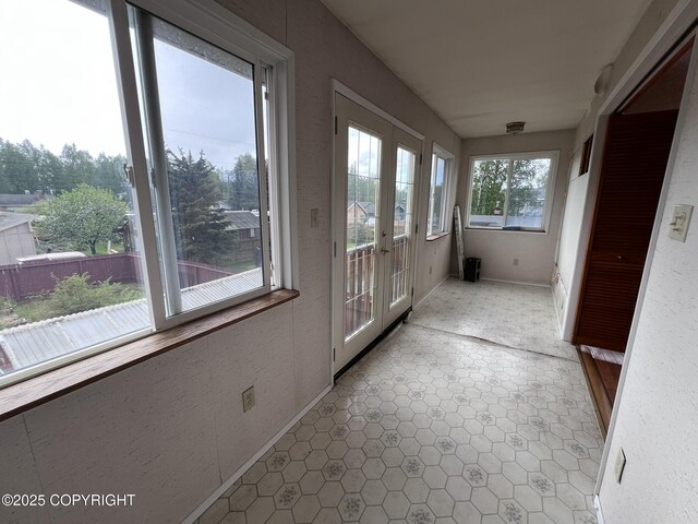 7700 Dover Ave, Anchorage, AK 99504 - unfurnished sunroom featuring french doors