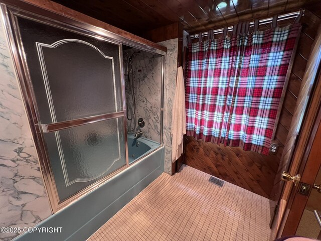 7700 Dover Ave, Anchorage, AK 99504 - bathroom featuring enclosed tub / shower combo and tile patterned floors
