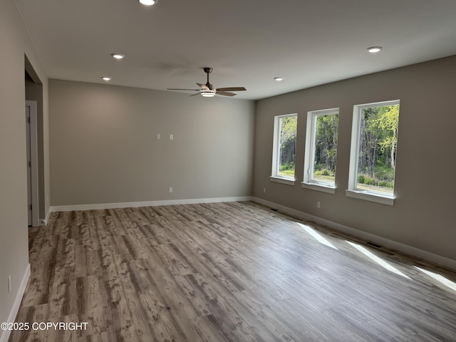 3120 W Wintergreen Dr, Wasilla, AK 99623 - unfurnished room featuring ceiling fan, wood finished floors, and recessed lighting