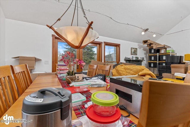 10613 Washington Cir, Anchorage, AK 99515 - dining space featuring vaulted ceiling