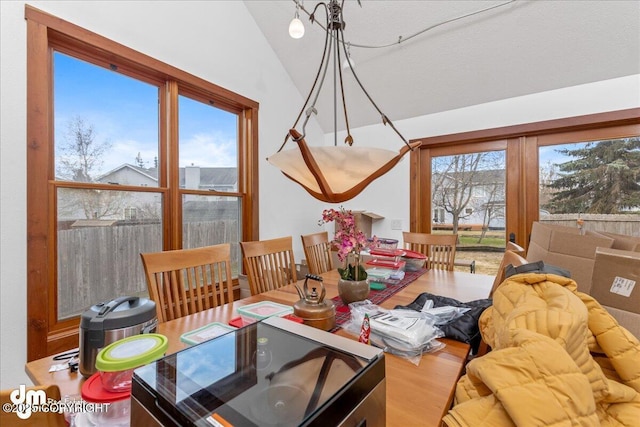 10613 Washington Cir, Anchorage, AK 99515 - dining area with lofted ceiling and wood finished floors