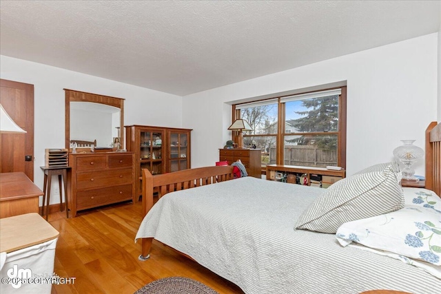 10613 Washington Cir, Anchorage, AK 99515 - bedroom featuring wood finished floors