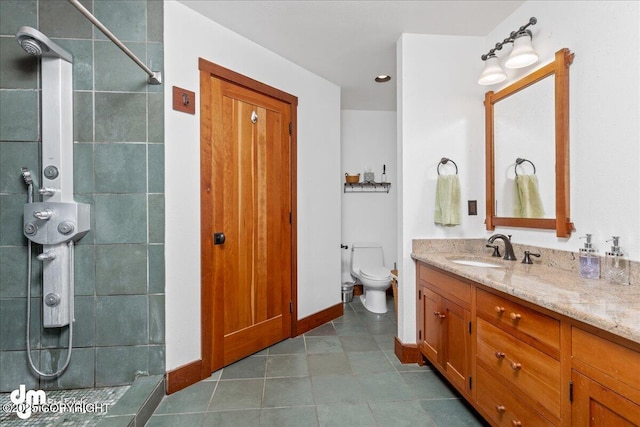 10613 Washington Cir, Anchorage, AK 99515 - full bath featuring a tile shower, toilet, vanity, tile patterned flooring, and baseboards