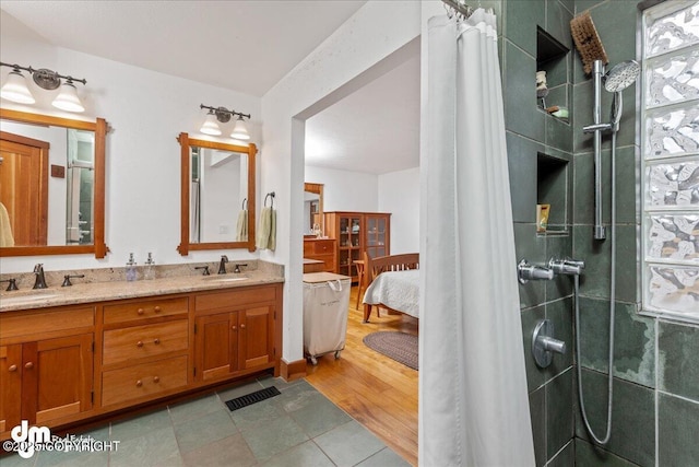 10613 Washington Cir, Anchorage, AK 99515 - ensuite bathroom with tiled shower and double vanity