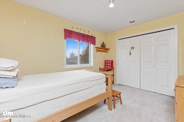 10613 Washington Cir, Anchorage, AK 99515 - bedroom with light colored carpet and a closet