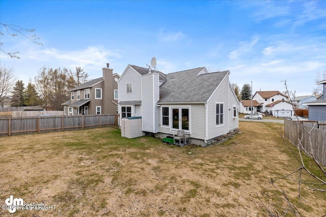 10613 Washington Cir, Anchorage, AK 99515 - rear view of property featuring a shingled roof and a residential view