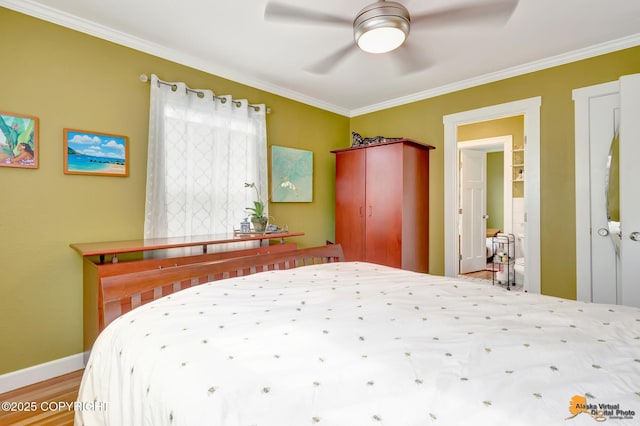 1008 Cordova St, Anchorage, AK 99501 - bedroom with crown molding, wood finished floors, baseboards, and ceiling fan