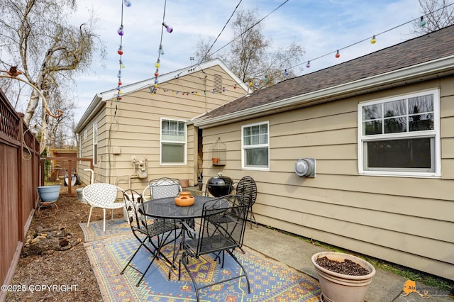 1008 Cordova St, Anchorage, AK 99501 - view of patio featuring outdoor dining space and fence