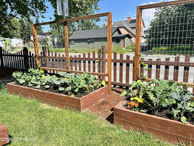 1008 Cordova St, Anchorage, AK 99501 - view of yard featuring a vegetable garden and fence
