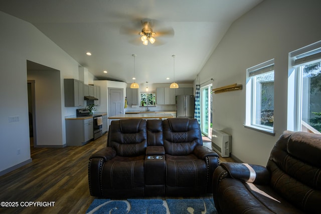 876 Lupine Ct, Homer, AK 99603 - living room featuring a ceiling fan, dark wood-style flooring, high vaulted ceiling, baseboards, and recessed lighting