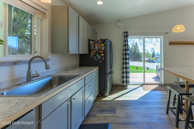 876 Lupine Ct, Homer, AK 99603 - kitchen featuring a sink, healthy amount of natural light, light countertops, recessed lighting, and dark wood-style flooring