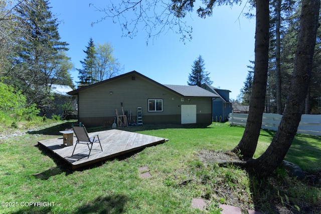876 Lupine Ct, Homer, AK 99603 - back of house featuring a lawn